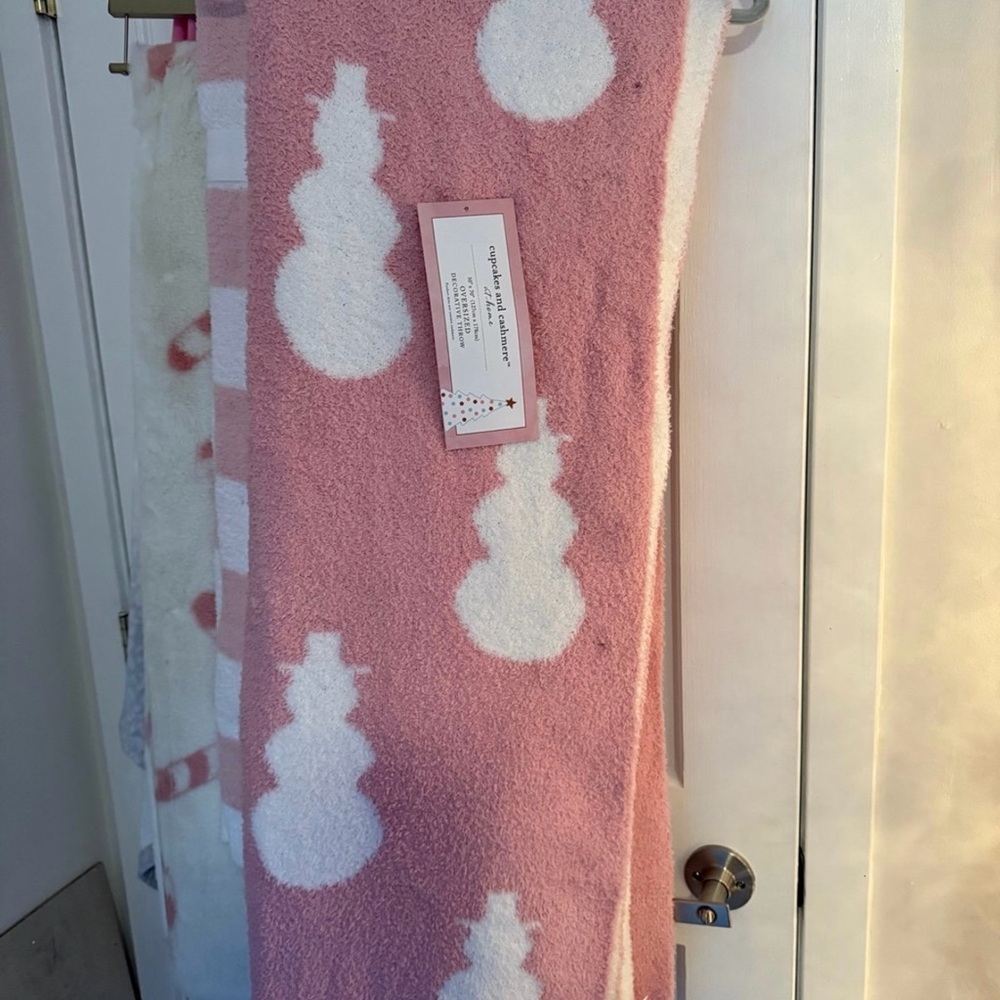 cupcakes & cashmere Pink and White Snowman Throw Blanket
